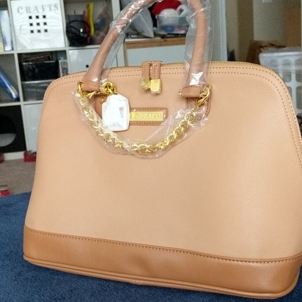 Joy and Iman purse